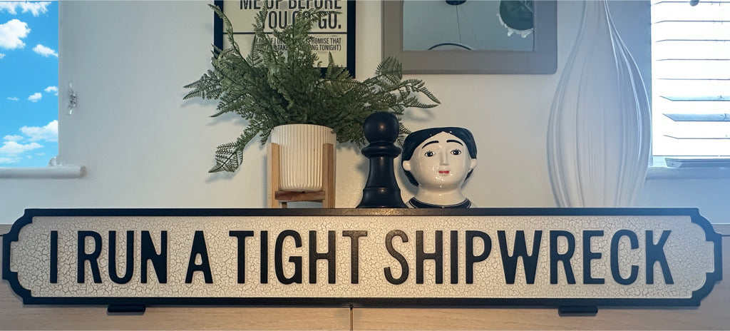 Tight Shipwreck Sign