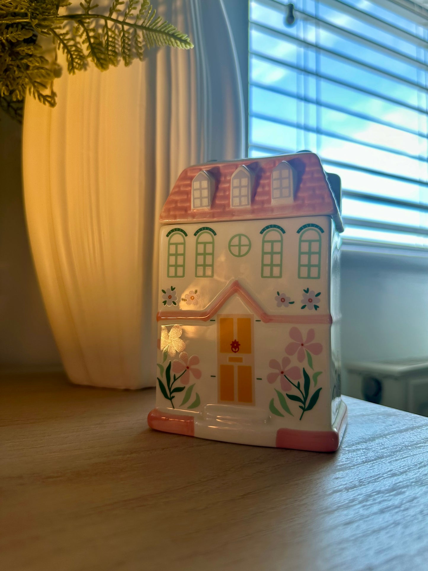 Pink house wax or oil warmer