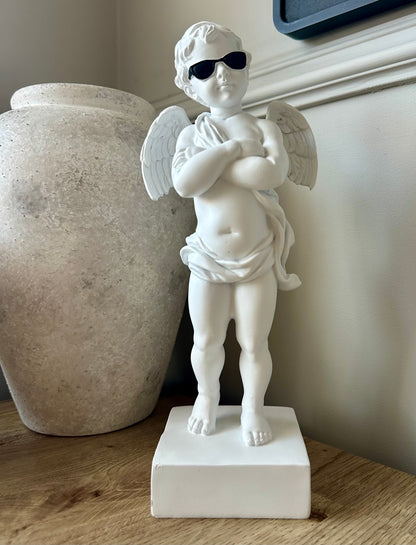 White "Too Cool" Cherub Figure on Base